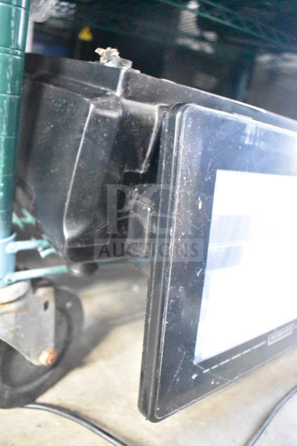 2017 Hobart HTi-7LH26 food portioning scale, tested and working, black casing, visible display screen, commercial use.
