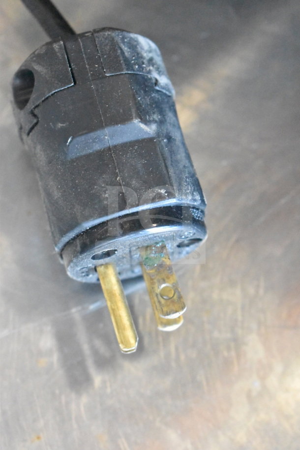 Close-up of the plug for the 2017 Hobart HTi-7LH26 Commercial Food Portioning Scale, showing signs of wear.
