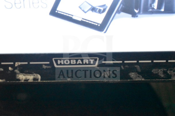 Hobart HTi-7LH26 commercial food portioning scale, tested and working. Visible wear on casing. Model label shown.