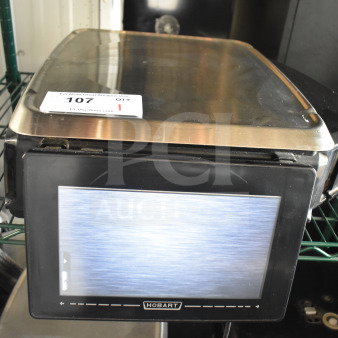 2017 Hobart HTi-7LH26 commercial food portioning scale, tested and working. Features digital display, 120/208-240V, 1 phase.