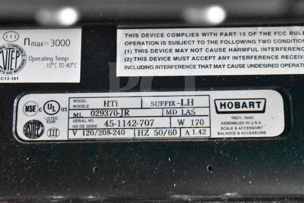 2016 Hobart HTi-LH commercial food portioning scale; model info and voltage specs shown; no power cord included.