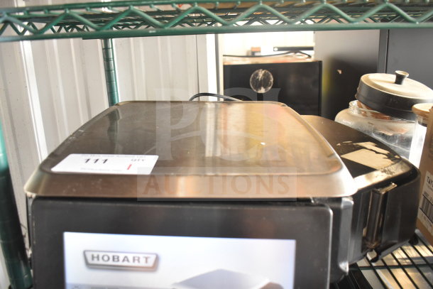 2017 Hobart HTi-7LH26 commercial scale, countertop model; tested working, 120/208-240V, 1 phase; shows Hobart label.