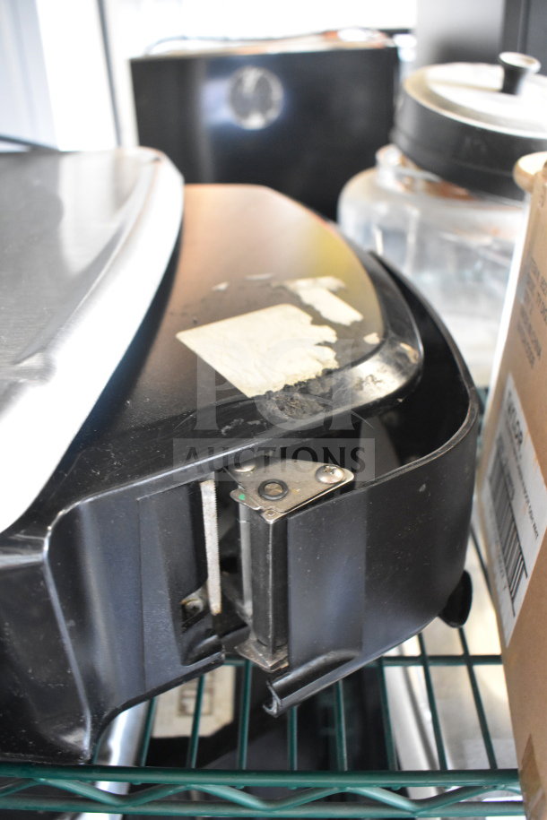 2017 Hobart HTi-7LH26 commercial food scale, black casing, minor surface wear, tested and working, 120/208-240V, 1 phase.