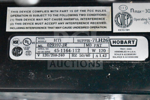 2017 Hobart HTi-7LH26 commercial scale label, showing model details, 120/208-240V, 1 phase, UL and NSF certified.