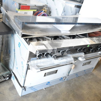 Garland G60-6G24CC range, new condition, features six burners, a 24" griddle, and dual convection ovens, 280,000 BTU.