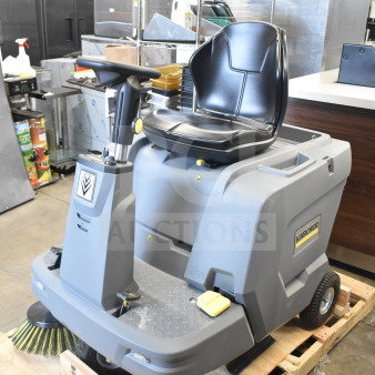 Brand new Karcher KM 85/50 R BP 24" ride-on sweeper, 1 side broom, AGM cordless, 13.2-gallon capacity, scratch and dent condition.