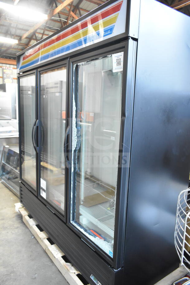 True GDM-72-HC 3-door cooler, scratch and dent, with broken glass. 115 volts, 1 phase, new condition except damage.