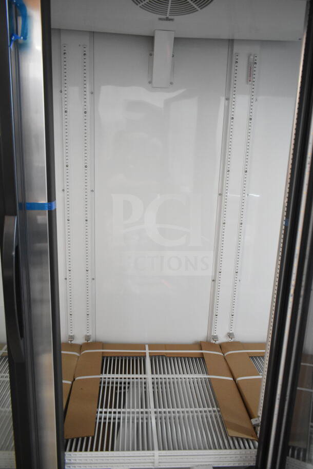 Brand new True GDM-72-HC commercial cooler, 3 glass doors, scratch and dent, 115 volts, see broken glass details.