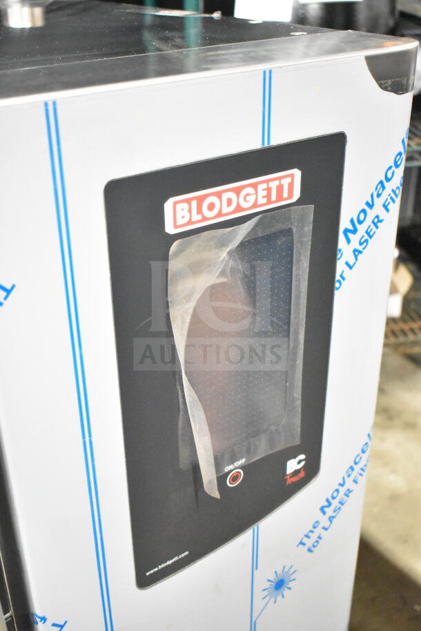 Blodgett BCT62/KPE-gas 2.06 combi convection oven, new with minor dents, logo visible on black control panel.