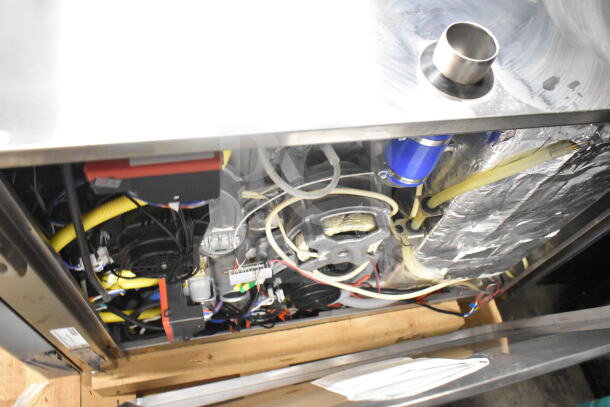Interior view of a new Blodgett BCT62/KPE-gas 2.06 combi convection oven showcasing wiring and components.
