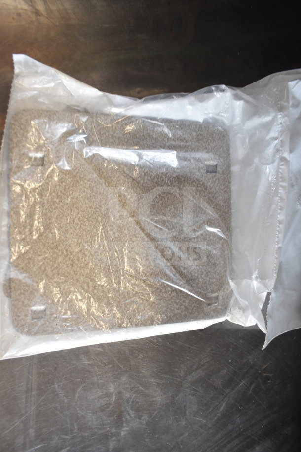 Sealed package of 7 Onn tablets, visible through clear plastic cover, showing protective film on top surface.