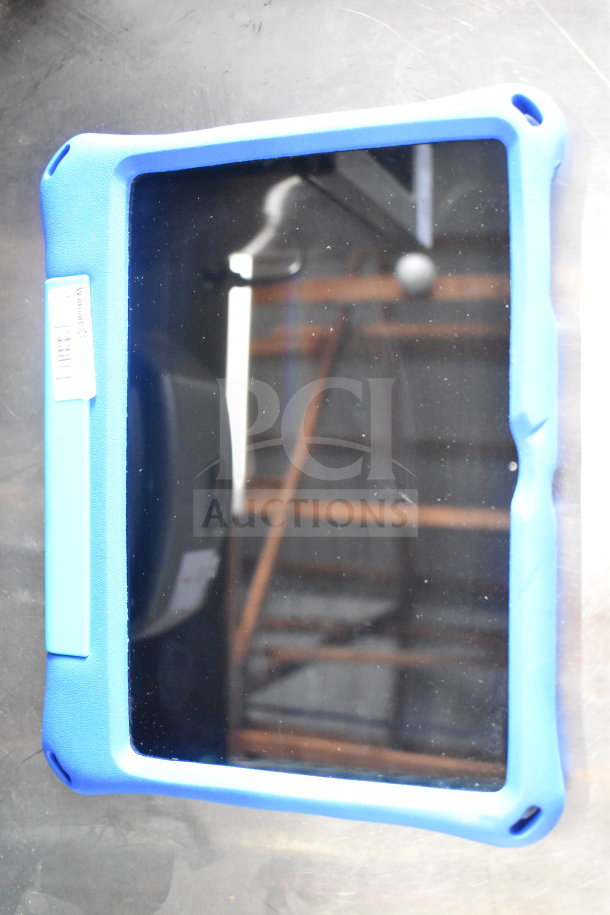 Seven Onn tablets with blue protective cases, showing front screens. Includes visible brand tag and barcode.