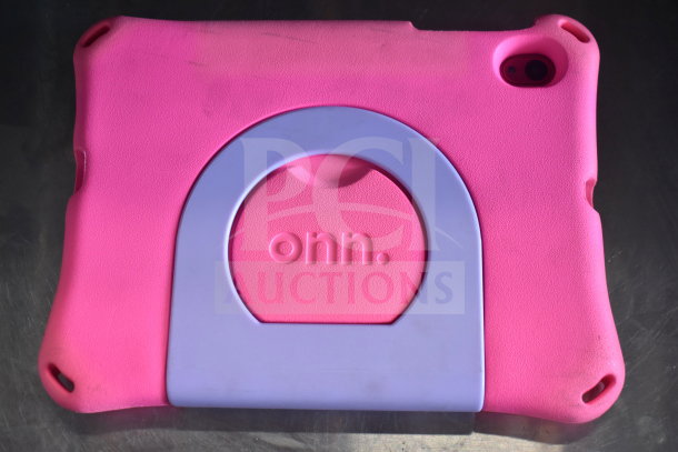Pink protective case for an Onn tablet with purple stand, showing the "onn." logo embossed on the back.