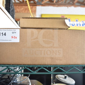 Boxed auction items including a Globe meat slicer blade remover and computer keyboard, labeled "114 QTY X2."