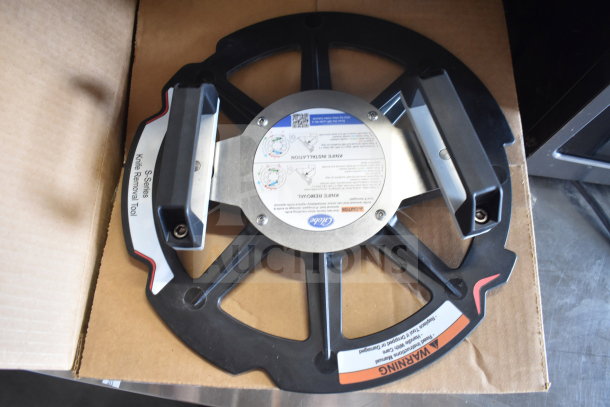Globe meat slicer blade remover with ergonomic handles, labeled as "S-Series Knife Removal Tool."
