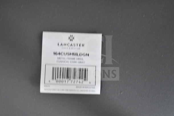 Lancaster Table & Seating label, 164CUSHMLDGN, metal frame vinyl cushion, dark gray, made in Malaysia.