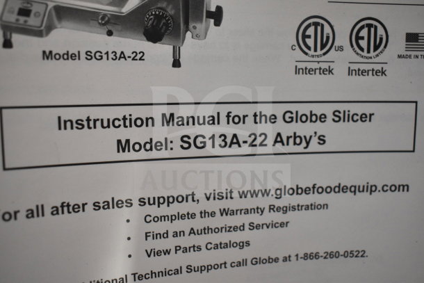 Instruction manual for Globe Slicer Model SG13A-22, detailing warranty and support information.