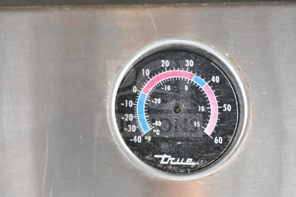 True T-49 Commercial Cooler detail showing temperature gauge with True logo, ranges -40°C to 60°F.
