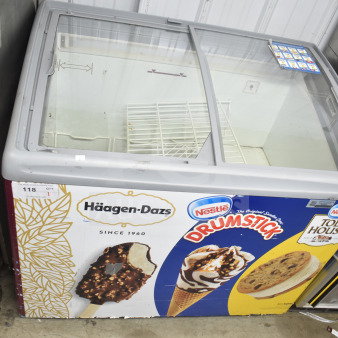 Commercial freezer merchandiser with glass sliding doors featuring Häagen-Dazs and Nestlé branding. 115 volts, 1 phase.