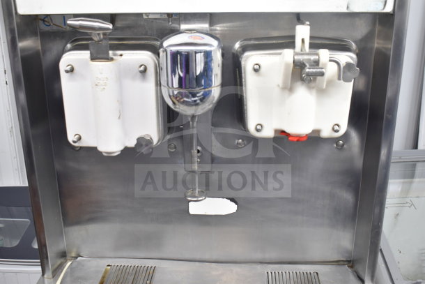 Taylor 632-33 commercial milkshake machine, air-cooled, 2-flavor, 208-230V, 3-phase, stainless steel, good condition.
