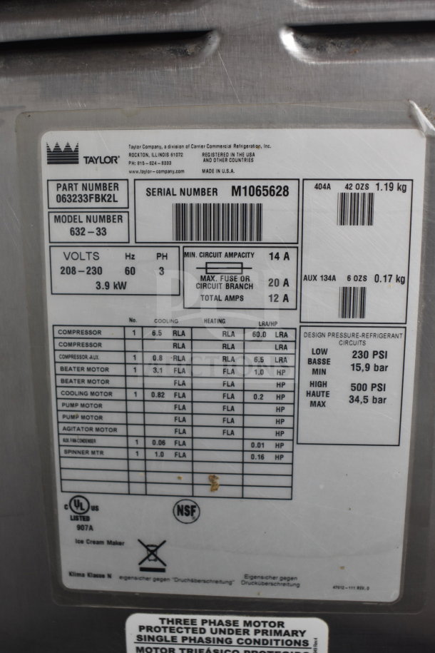 Taylor 632-33 milkshake machine, commercial-grade, air-cooled, 2 flavors, 208-230V, 3-phase, part and serial numbers visible.