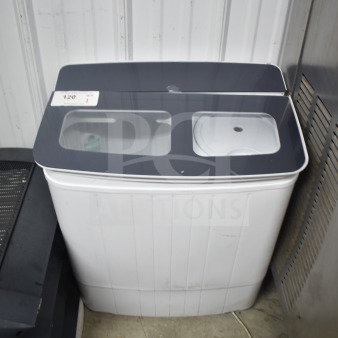 H01GN001 washing machine, 110V, 1 phase. Dual compartment top, visible label indicating model. Gently used condition.