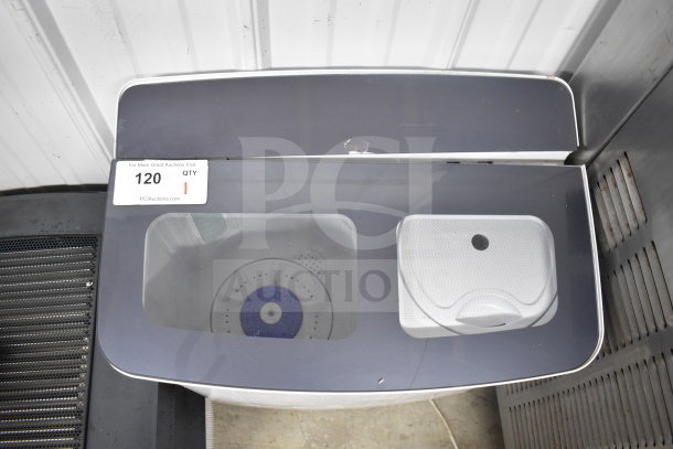 H01GN001 washing machine, 110 volts, 1 phase. Model H01GN001. Visible auction tag, item #120.