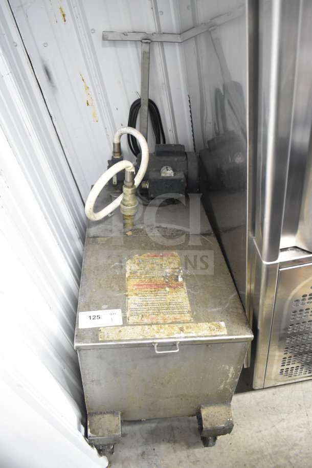Frontline 402 Commercial Oil Caddy with commercial casters. Visible wear and label. 120 volts, 1 phase.