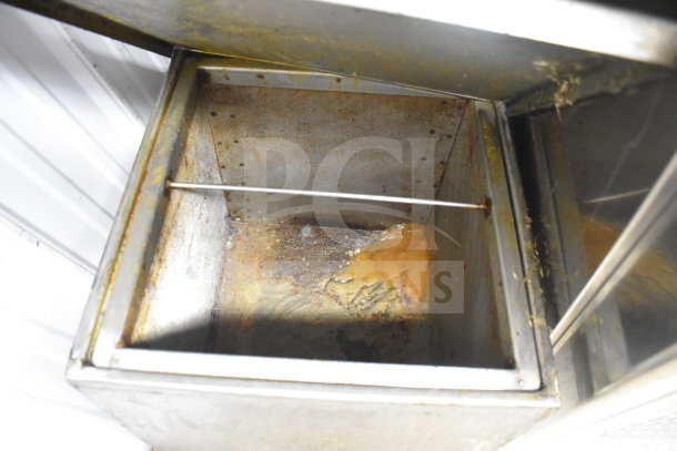 Frontline 402 Commercial Oil Caddy, 120V, 1 Phase, on commercial casters. Visible wear inside.