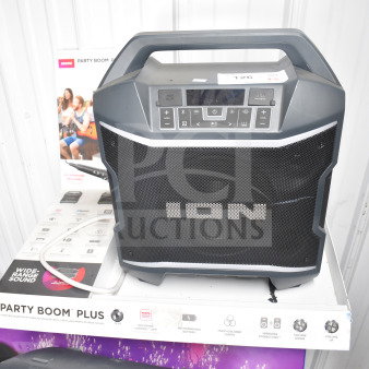Ion Party Boom Plus Speaker on a store display pedestal. Features include wide-range sound and multi-colored lights.
