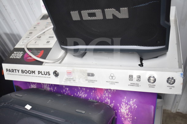 ION Party Boom Plus speaker display, featuring Bluetooth, rechargeable battery, multi-colored lights, and stereo-link.