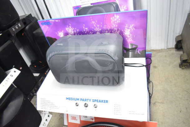 Onn Medium Party Speaker store display. Features Bluetooth, IPX7 waterproof, 200 watts. Includes original packaging.