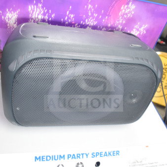 Onn medium party speaker on display, featuring a mesh grille, sleek design, and visible label reading "Medium Party Speaker."