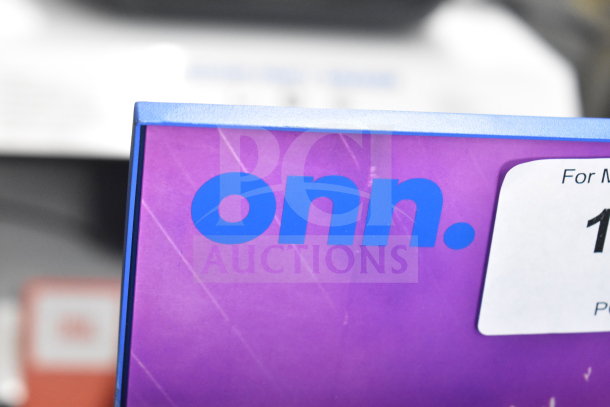 Onn medium party speaker in retail display box, purple with blue logo, showing partial label.