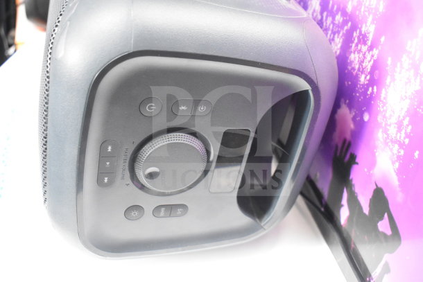 Onn Medium Party Speaker with control panel showing power, volume, and playback buttons. New condition, ideal for events.