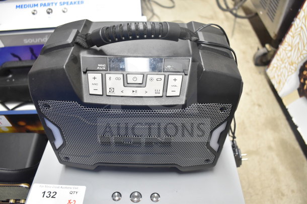Ion speaker with control panel, features mic and USB inputs, volume controls. In good condition, display model for auction.