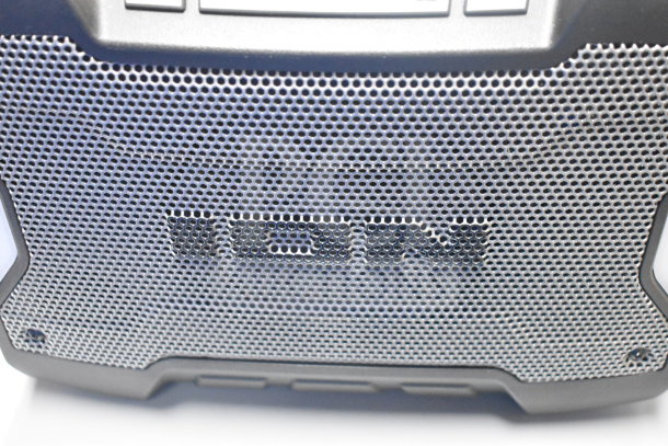 Ion speaker close-up showing branded grille, part of a 2-store display auction item.