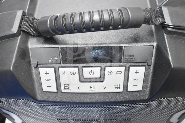 Ion speaker control panel with handle, featuring buttons for mic, volume, and EQ settings. Good condition.