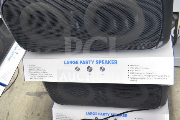 Onn Large Party Speaker display showing features like Bluetooth, 640W power, bass boost, and IPX4 water resistance.
