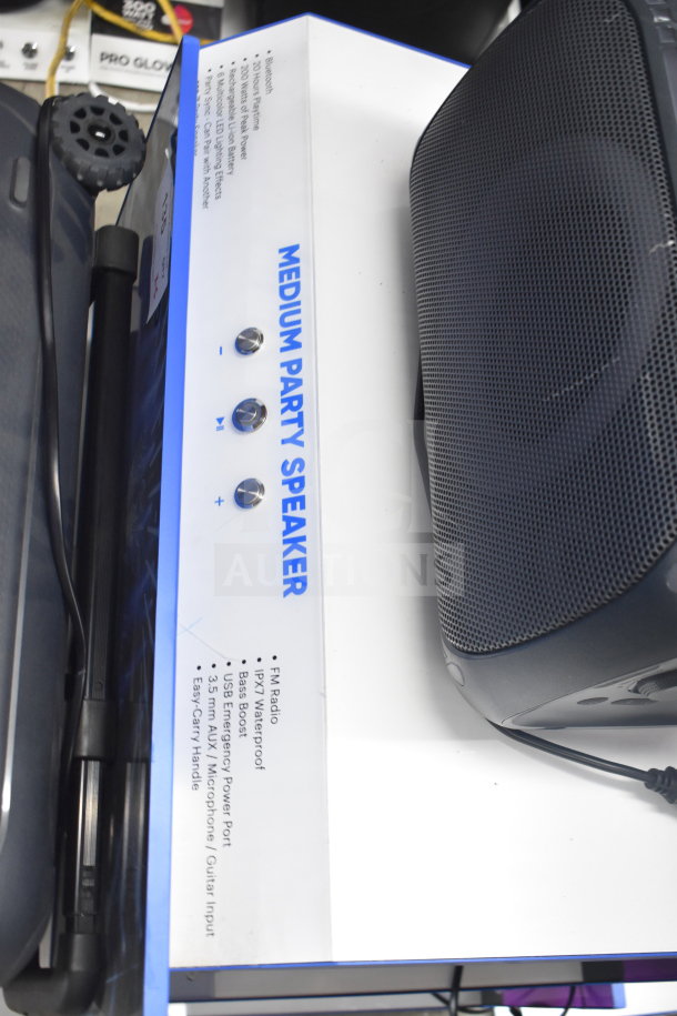 4 Onn Medium Party Speakers on display, featuring Bluetooth, FM radio, IPX7 waterproof, and bass boost.