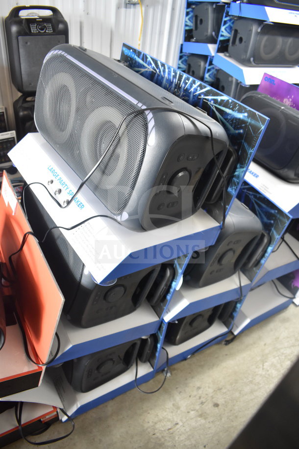 5 Onn Large Party Speakers in store display, new condition. Features include Bluetooth connectivity and vibrant design.