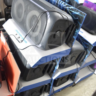5 Onn Large Party Speakers in store display, new condition. Features include Bluetooth connectivity and vibrant design.