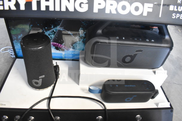 2-store display with Hydrajet Hydramotion speakers, featuring Bluetooth connectivity, waterproof design, and sleek black finish.
