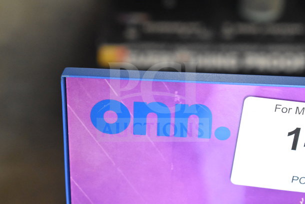 Onn medium party speaker display with blue logo on purple background. Part of 3-store display auction item.