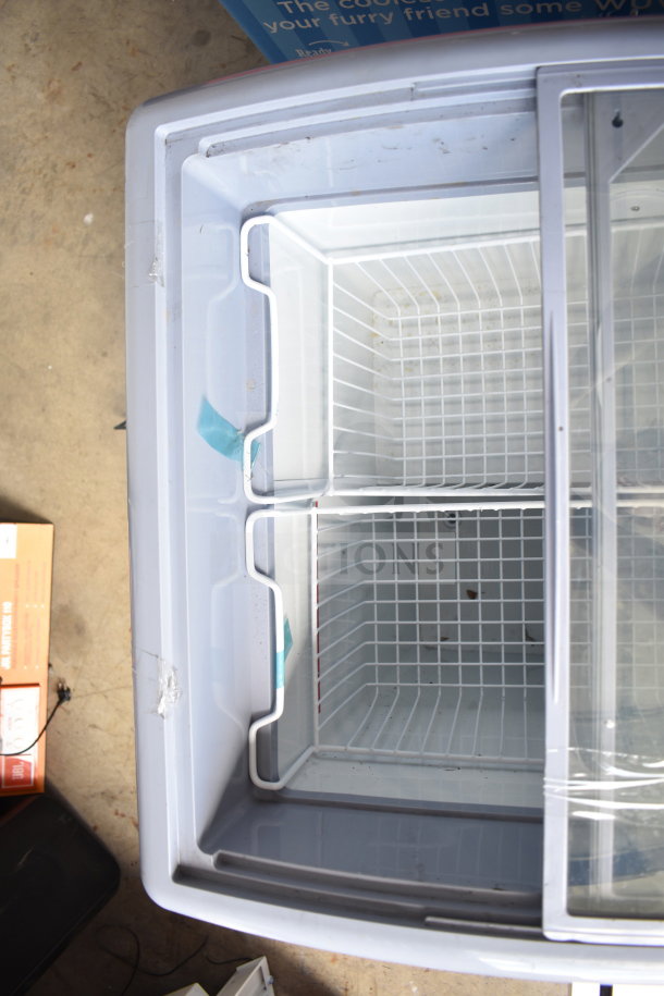 XS-160Y Commercial Chest Freezer Merchandiser with glass sliding doors. Interior wire baskets, 115 Volts, 1 Phase.