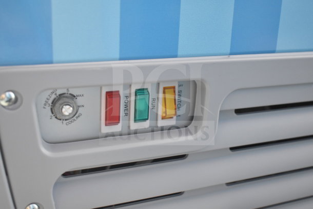 XS-160Y Commercial Chest Freezer control panel, featuring temperature dial and labeled power switches.