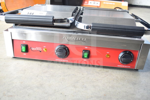 2023 Avantco 177PG400S countertop double panini press with temperature controls, dual green switches, and durable stainless steel design.