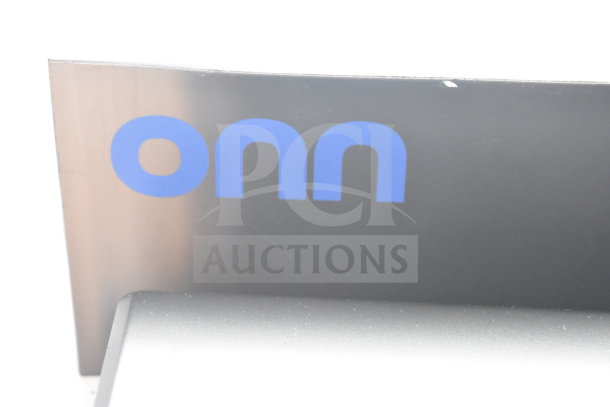 Store display featuring ONN logo, associated with speakers and soundbar. Condition appears used, ideal for audio enthusiasts.