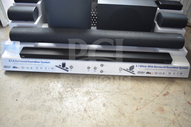Store display featuring a 5.1.2 surround soundbar system with wireless subwoofer and satellite speakers, including Dolby Atmos and DTS:X technologies.