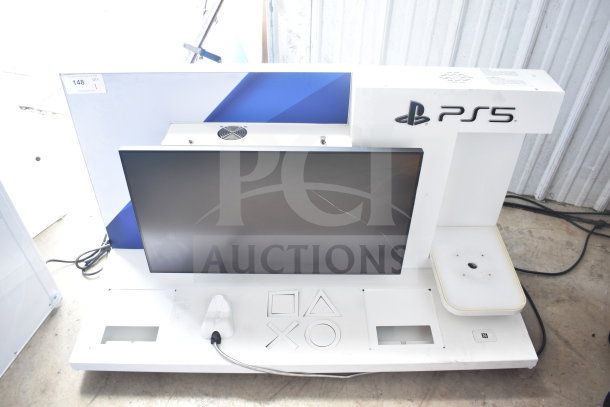 PS5 Outform UE200205-C commercial display, used condition, with console logo and controller outlines, ideal for store setups.
